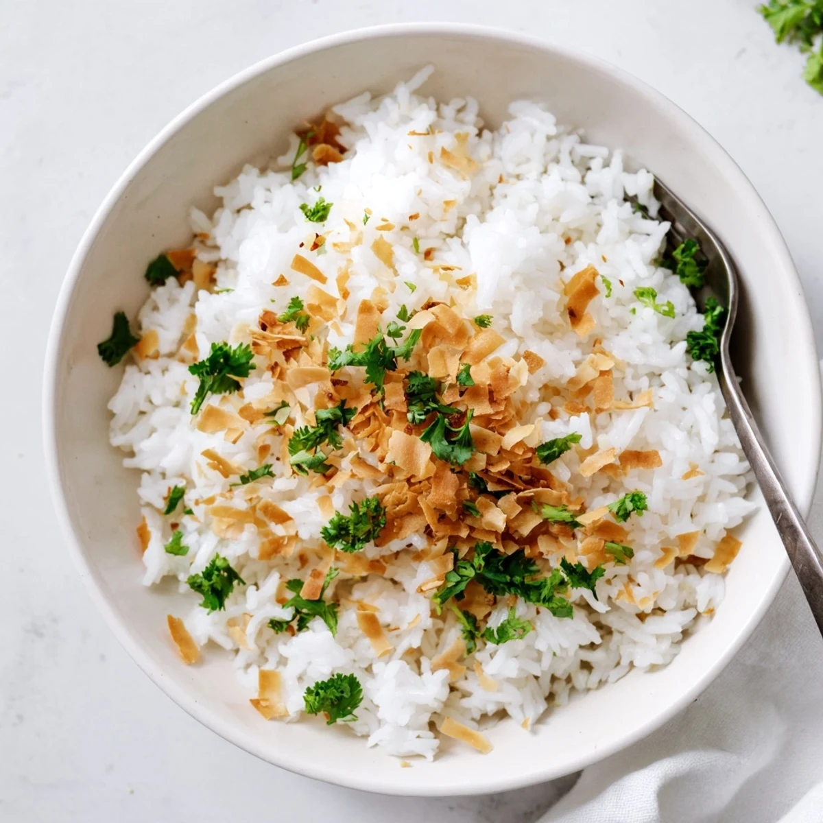 Creamy white coconut rice with tender grains, perfect side dish for Thai curries and grilled meats.