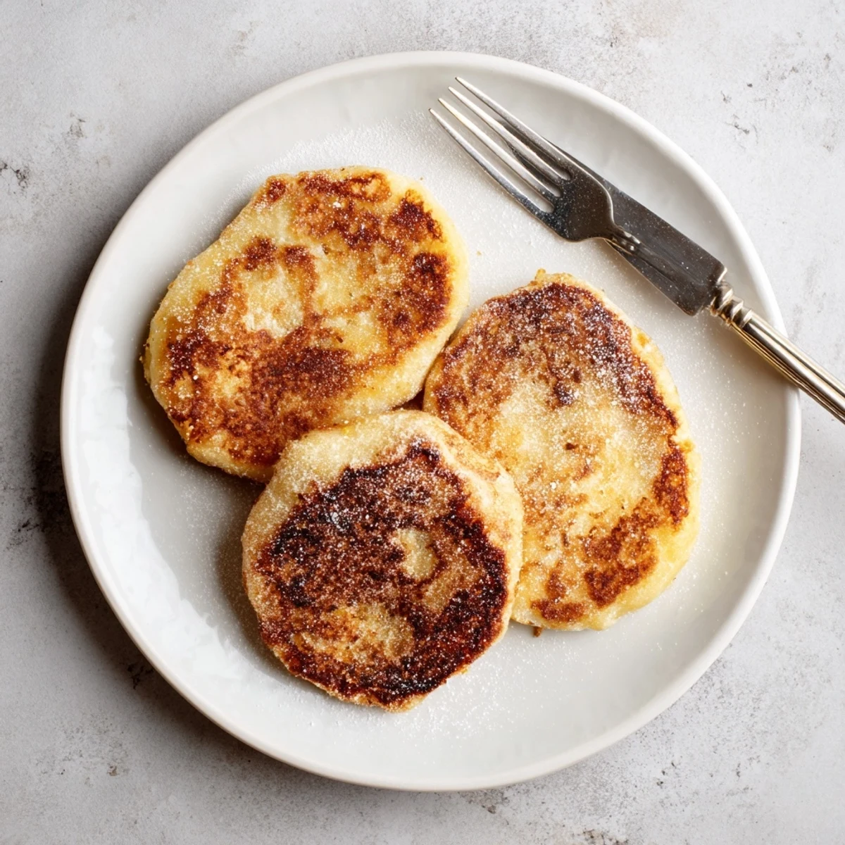 Crispy pan-fried Irish potato cakes served warm with a pat of butter