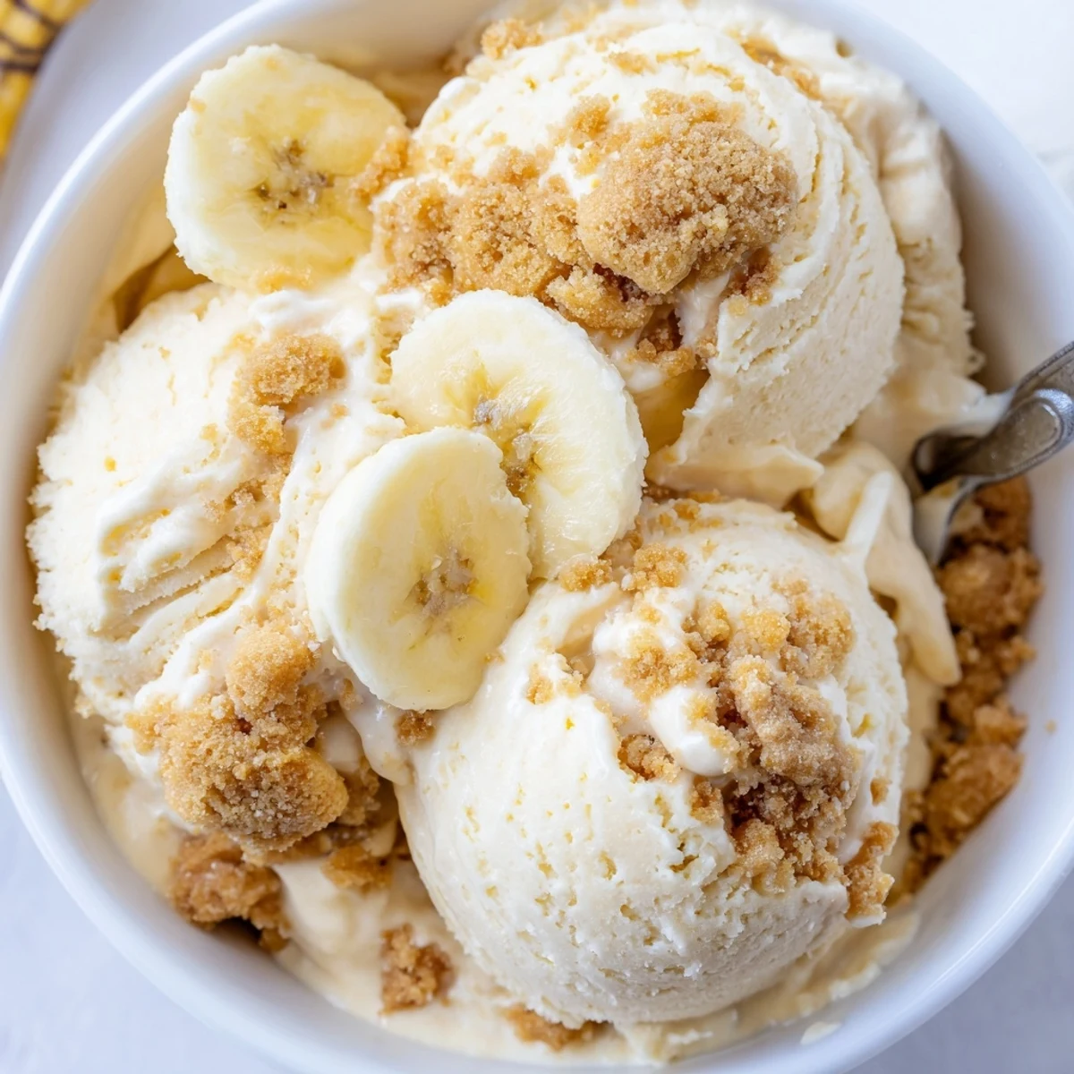 Ninja Creami Banana Cream Pie Ice Cream scoops with golden graham swirl