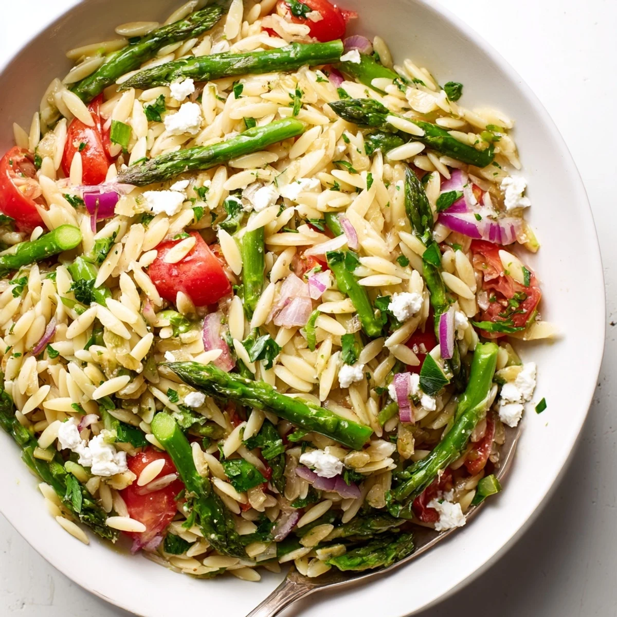 Chilled Asparagus Orzo Salad With Lemon Vinaigrette, tangy lemon dressing and cherry tomatoes