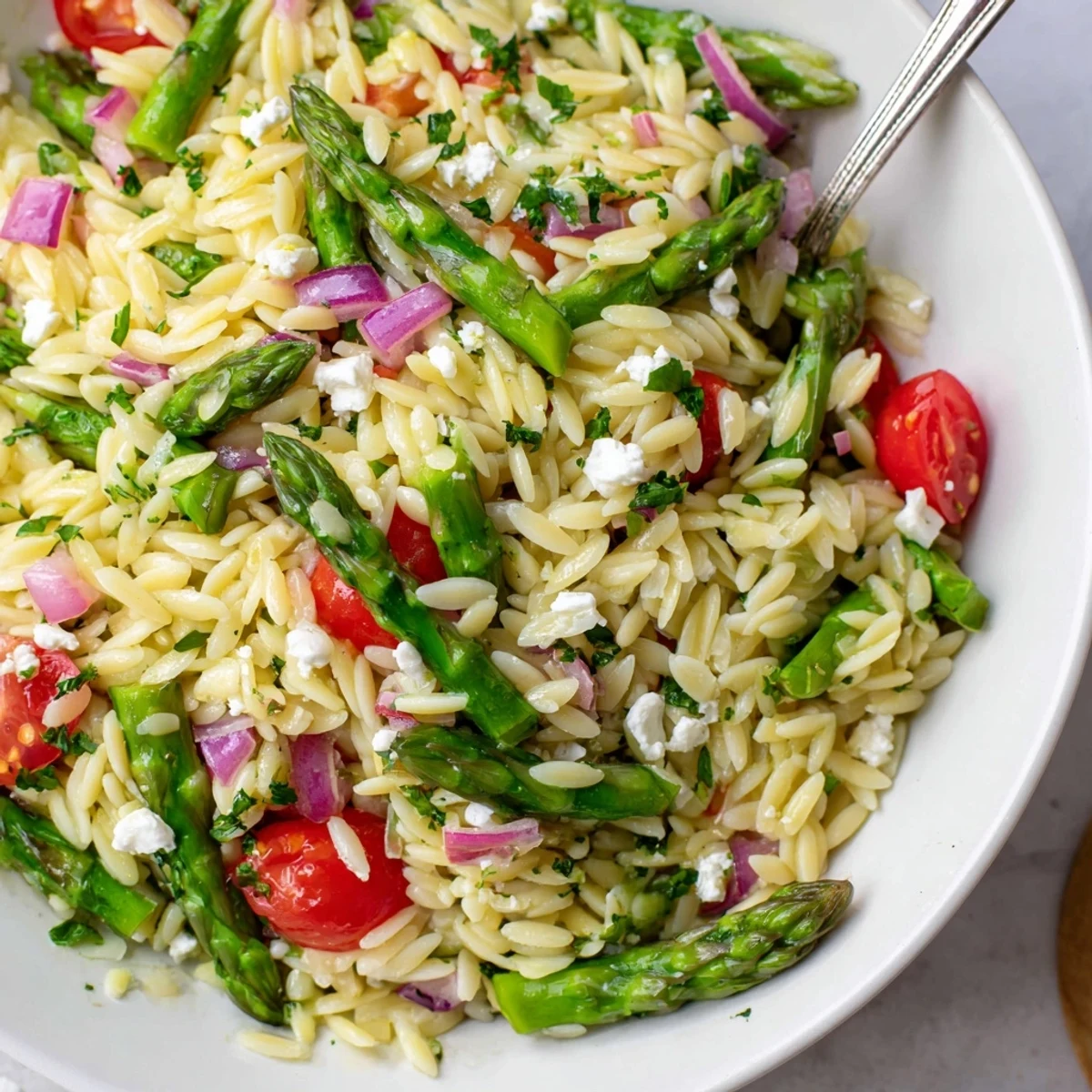 Picnic ready Asparagus Orzo Salad With Lemon Vinaigrette, tender pasta, herbs, fragrant citrus