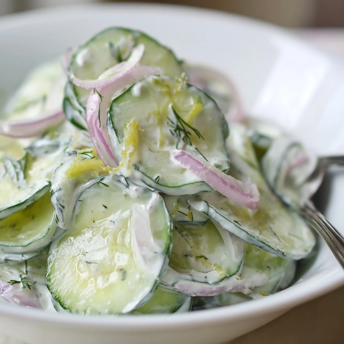 Weeknight Tzatziki Cucumber Salad Recipe served with warm pita and grilled chicken