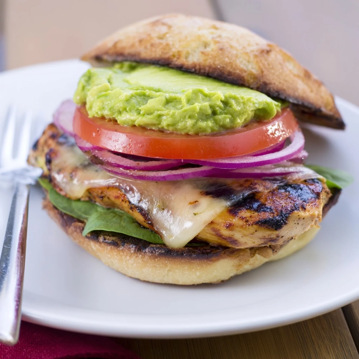 Grilled Chicken Avocado Sandwich served warm with juicy chicken, zesty Dijon-mayo, greens