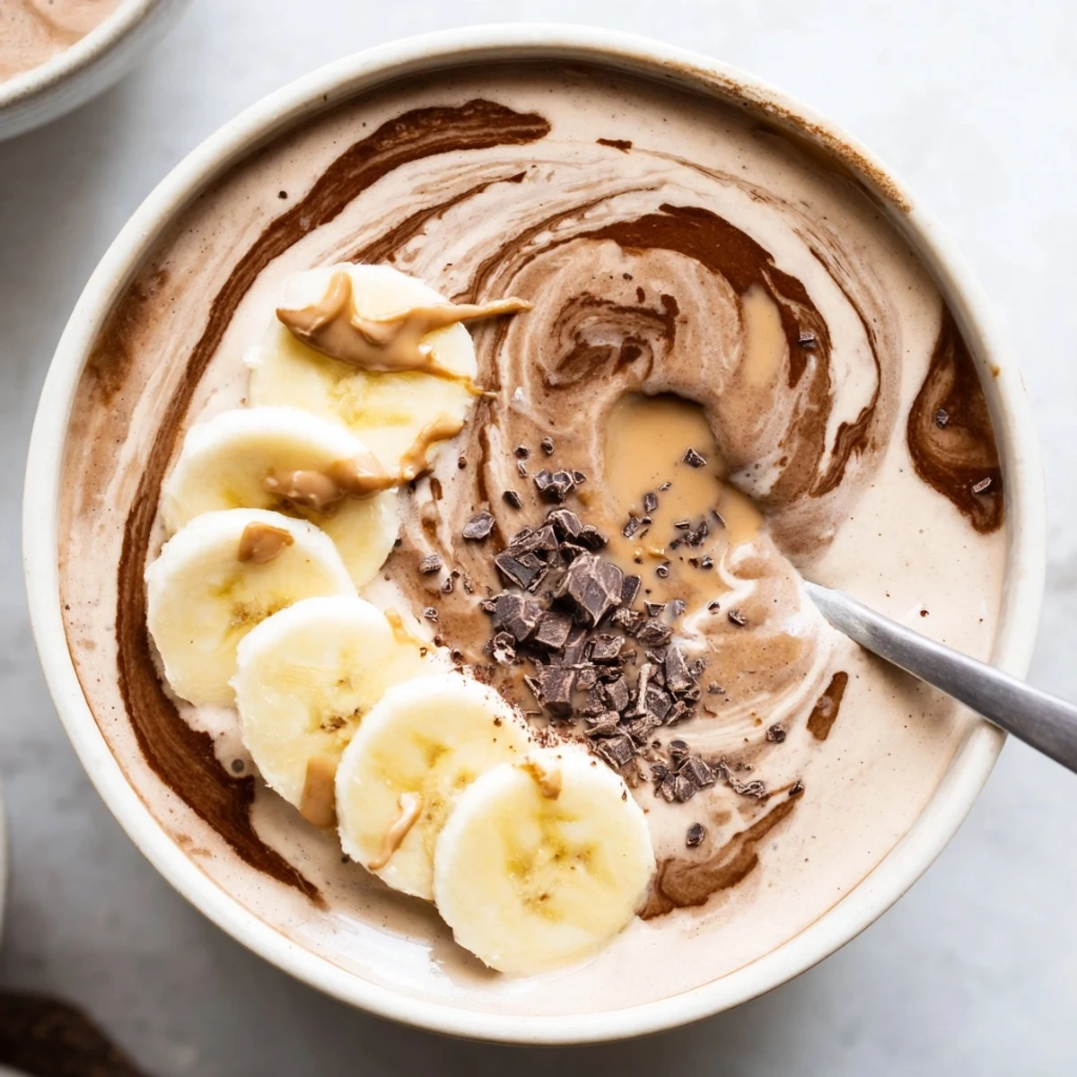 Chocolate Peanut Butter Banana smoothie served cold, perfect breakfast or post workout snack