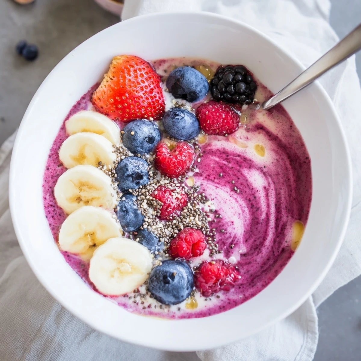 Bright Summer Berry Smoothie poured from blender, tangy, cold breakfast pick-me-up