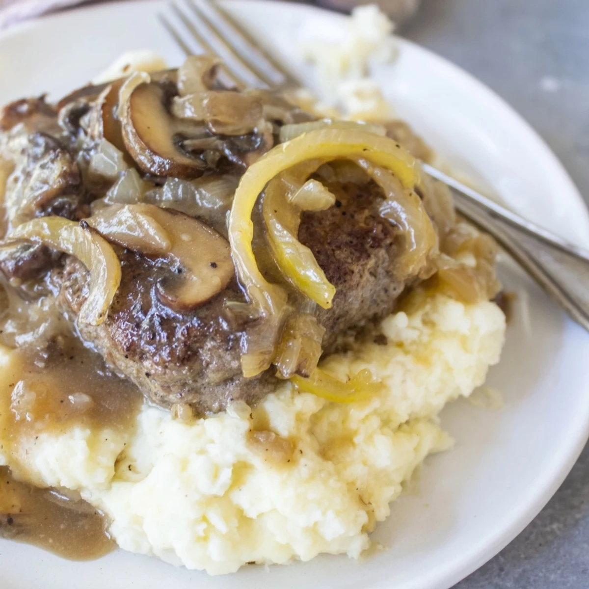 Serve Country Style Smothered Cube Steak Recipe hot with buttered egg noodles