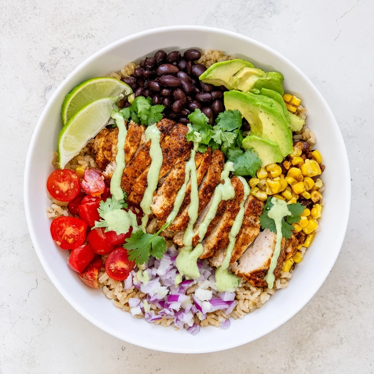 Grilled chicken served over brown rice with charred street corn and tangy drizzle