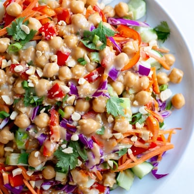 Colorful Crunchy Thai Chickpea Salad tossed in zesty peanut lime dressing